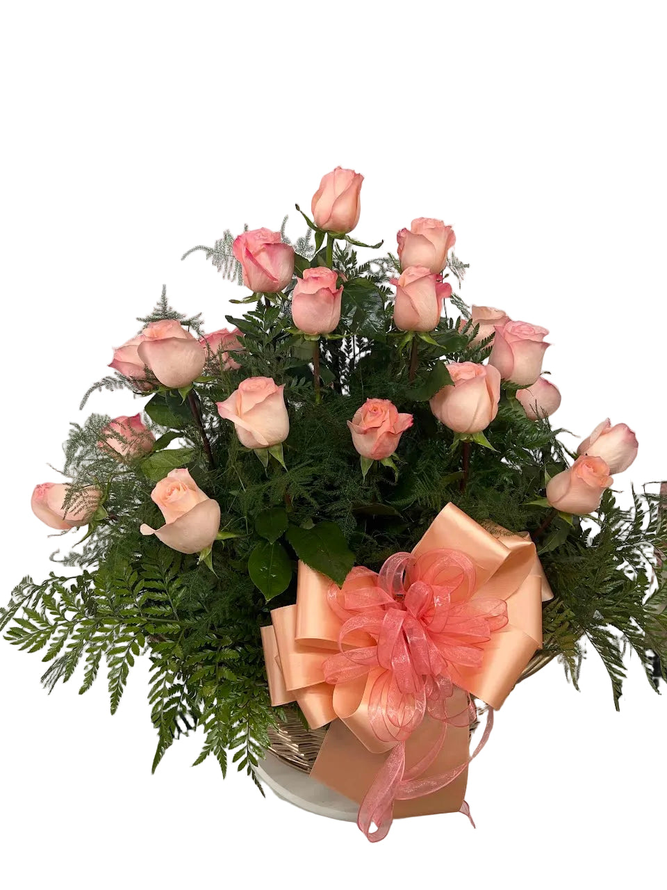 Premium blush pink rose arrangement in basket with decorative satin bow and fresh greenery
