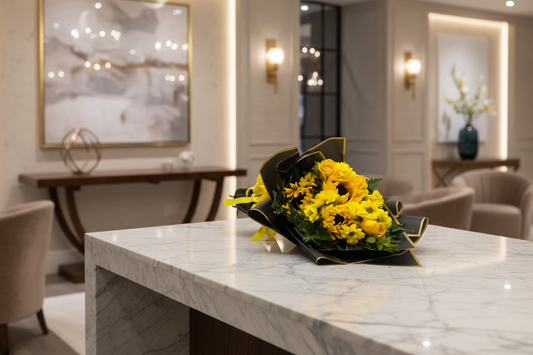 Yellow Flower Day bouquet with black luxury wrapping and yellow flowers in Houston