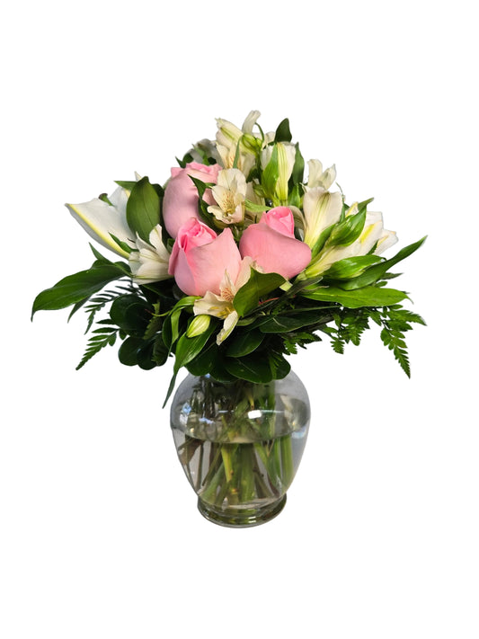 Blush pink rose and white alstroemeria vase arrangement with greenery from a Houston florist