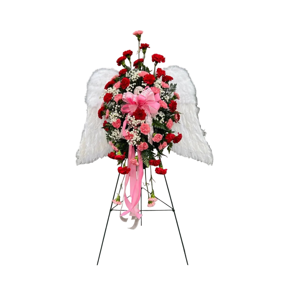Angel wings funeral spray with pink and red carnations on easel stand for Houston delivery