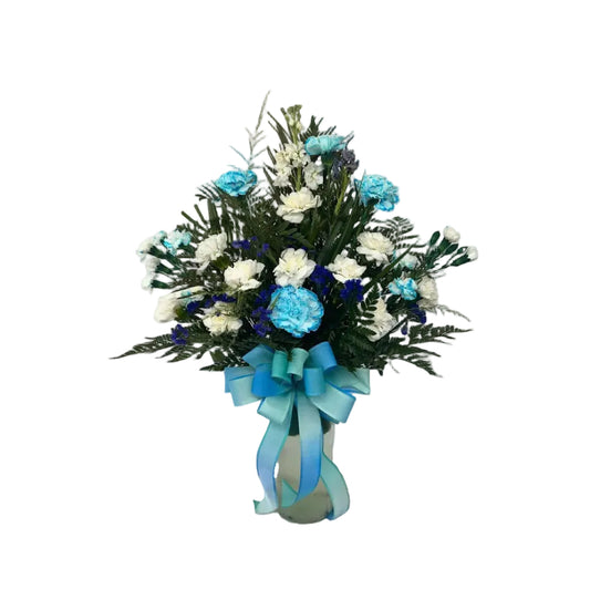 Blue Harmony Vase Arrangement with blue and white carnations stock fresh greenery and ribbon by Houston florist