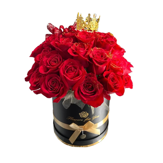 Luxury red rose crown box arrangement in black hat box with gold accents by Houston florist