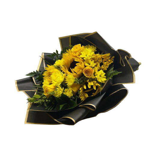 Luxury yellow wrapped bouquet with roses and mums for same-day flower delivery in Houston