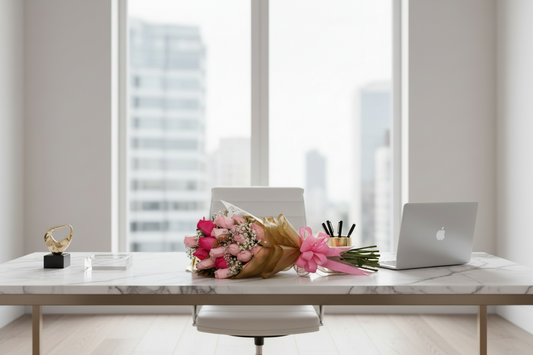 Pink rose hand tied bouquet with blush roses hot pink roses and elegant wrap for Houston flower delivery