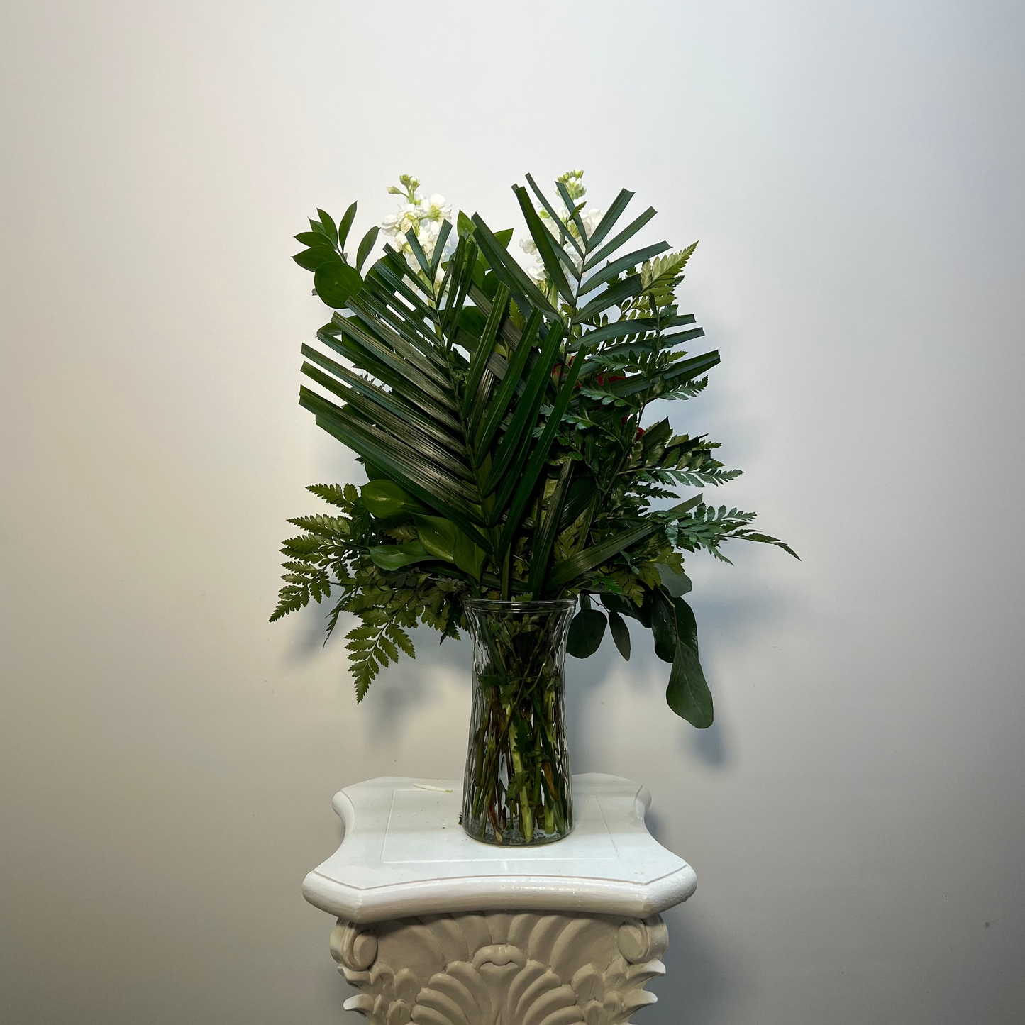 Red and white flower vase arrangement with roses hydrangea stock and greenery in Houston