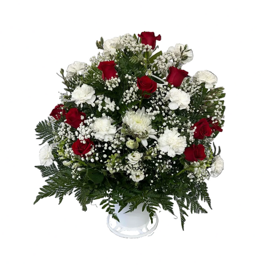 Red and white sympathy basket with red roses white carnations baby breath and fresh greenery by Houston florist