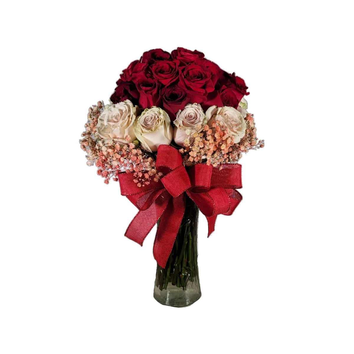 Romantic red and blush rose vase arrangement with tinted baby breath and satin ribbon by Houston florist