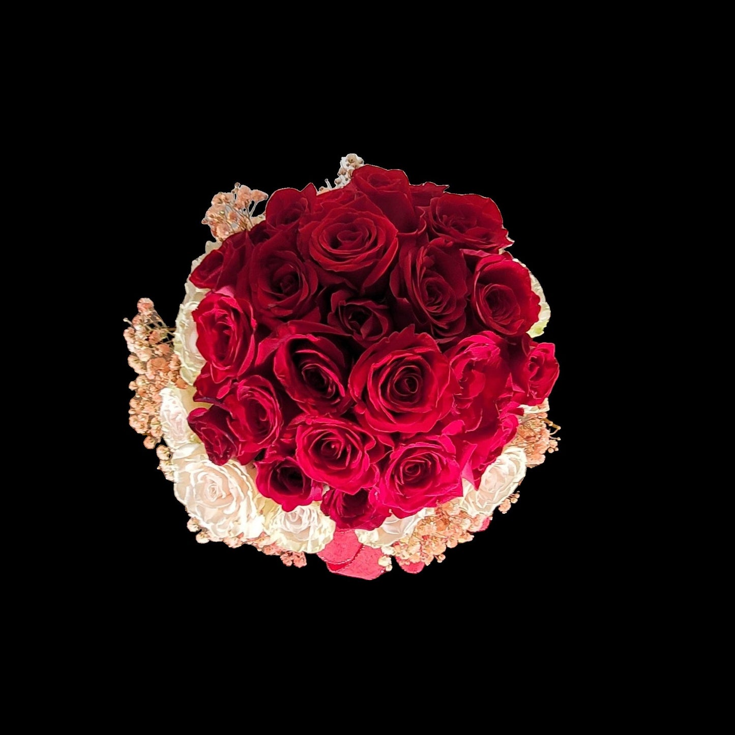 Top view of romantic red and blush rose vase arrangement with premium roses and tinted baby breath in Houston