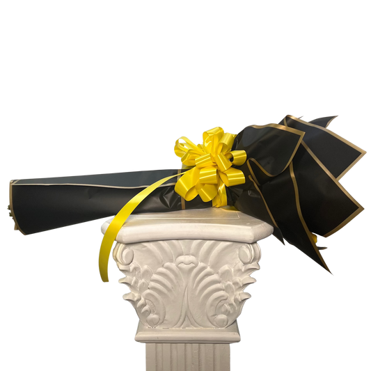 Side view of wrapped yellow rose bouquet with black floral paper by Houston florist